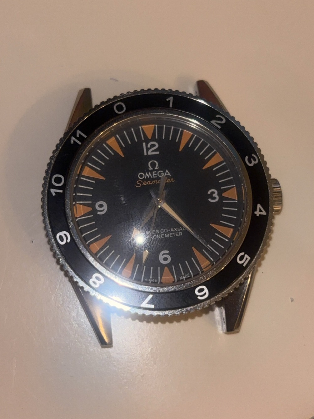 Omega Men's Black Dial Watch Head with Orange Accents